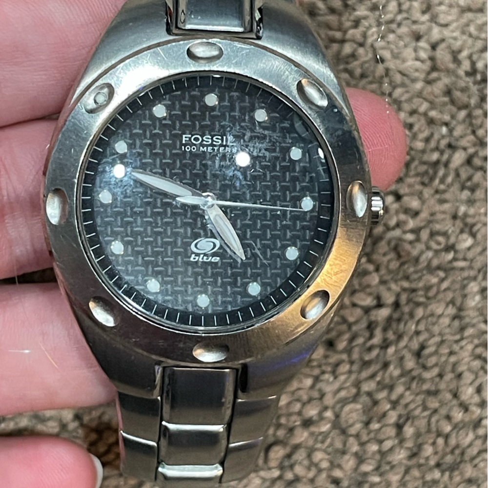 Fossil Blue men’s Watch. Silver bracelet with dark grey textured face